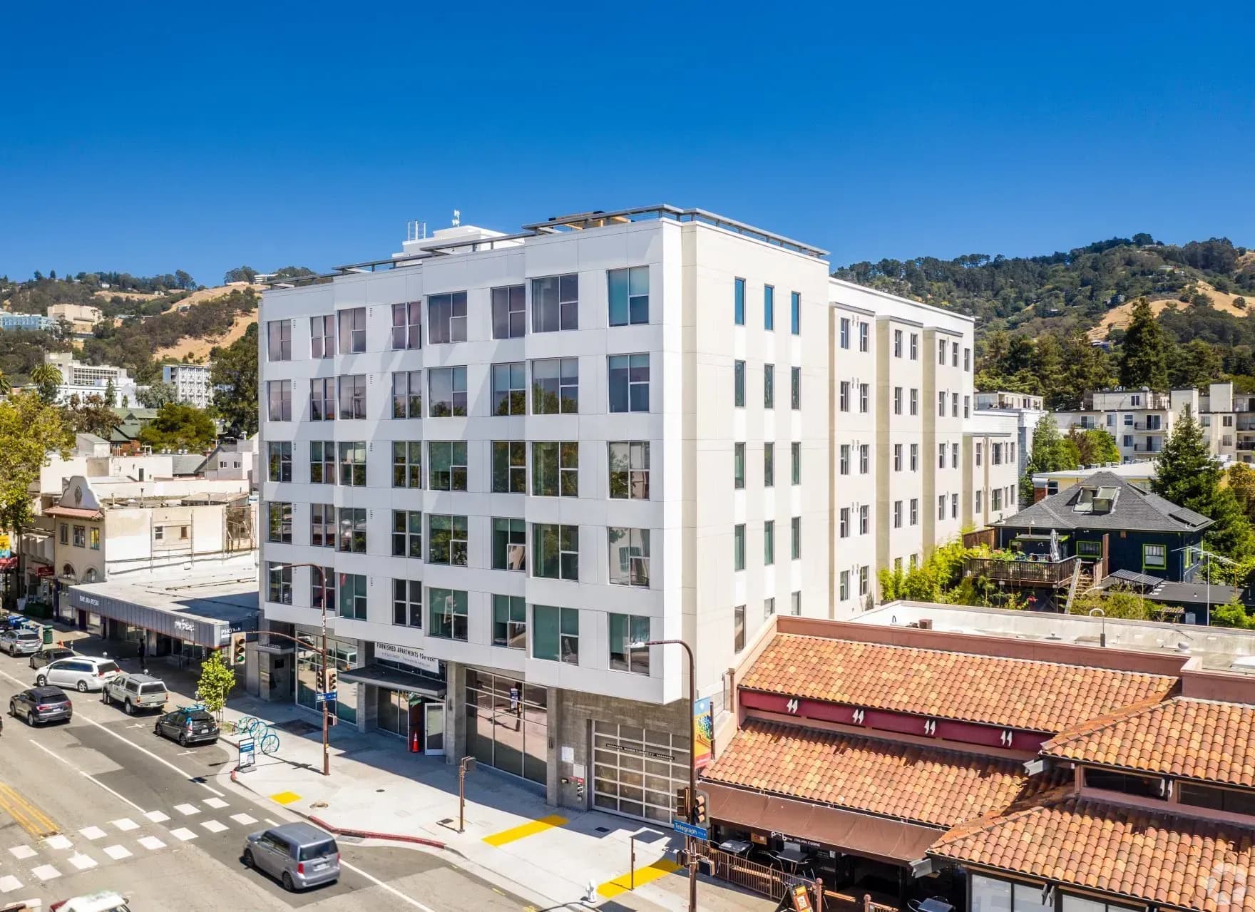 Panoramic Berkeley at 2539 Telegraph Avenue: a six-story, 70-unit furnished apartment building in Southside Berkeley, six minutes' walk to Sather Gate